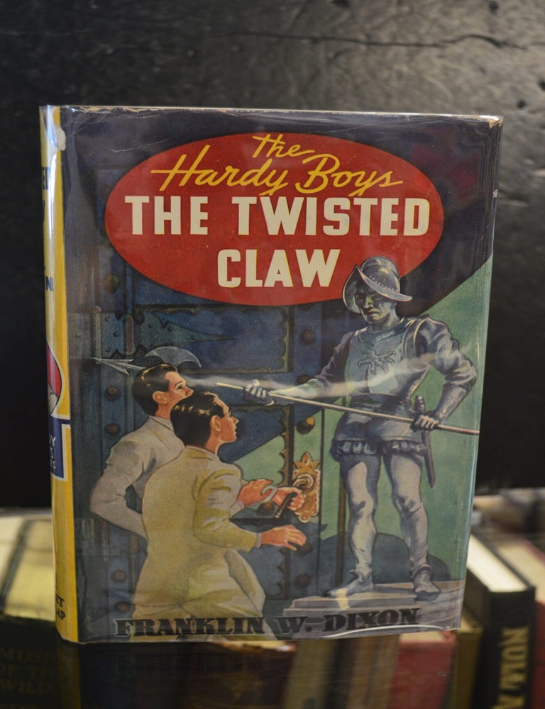 Item #78350 The Hardy Boys #18: The Twisted Claw. Franklin W. Dixon, Paul Laune.