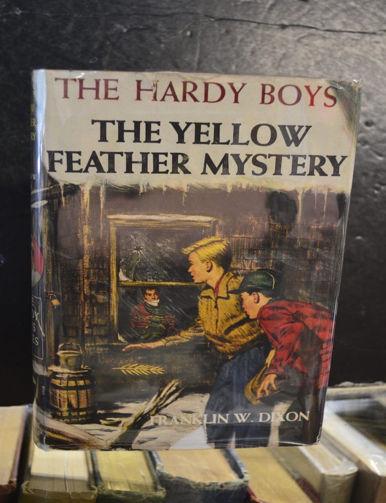 Item #78366 The Hardy Boys #33: The Yellow Feather Mystery. Franklin W. Dixon.